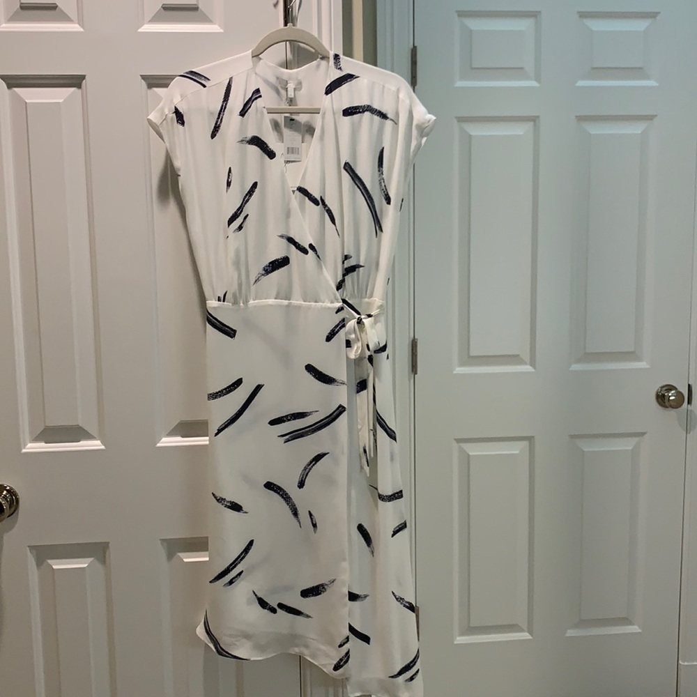 White and blue asymmetrical wrap dress